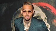 Chris Brown gets stuck in the air at New Jersey concert and shouts at crew as they’re forced to help in chaotic video
