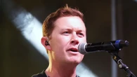 American Idol’s Scotty McCreery abruptly stops show and kicks ‘coward’ man for ‘hitting a woman’ at Colorado State Fair