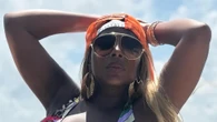Mary J. Blige, 54, reveals breathtaking beach body in a rainbow bikini on boat