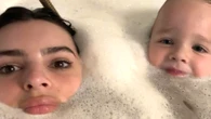 Emily Ratajkowski takes a bath with her son Sly, 3, after date night with Shaboozey