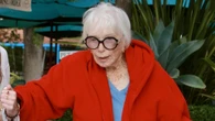 Hollywood icon Shirley MacLaine, 91, clings to friend’s arm as she leaves Malibu Italian restaurant in rare sighting