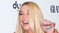 Kesha suffers embarrassing wardrobe malfunction as she flashes bare butt and loses shoe at Glamour Awards in Berlin