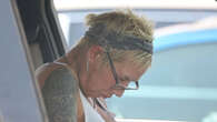 Reclusive Kim Mathers is seen sleeping at the wheel of her car during shopping trip after downsizing home & 45-day rehab