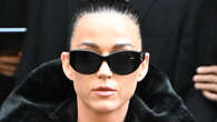 Katy Perry goes topless under black fur coat as she flashes rock hard abs at Balenciaga show