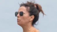 Eva Longoria, 49, defies her age as she reveals stunning beach body in teeny bikini during vacation in Spain