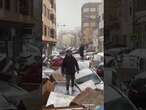 Cars piled up on Valencia streets after deadly flood