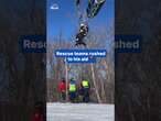 Terrified child dangles from a ski lift