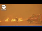 Firefighters battle flames in California as heatwave scorches West
