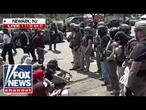 WATCH: Protesters CLASH with federal agents outside NJ facility
