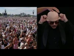 Fãs de Pitbull participam de tentativa de recorde com toucas de careca | AFP