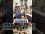 Diddy supporters celebrate outside court with baby oil