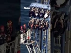 Stomach-churning moment students left stranded on 100ft-high rollercoaster for hours