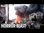 Building EXPLODES metres from crowd in Israeli strike on Lebanon
