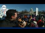 Demonstrators protest mass government layoffs outside of US Capitol