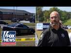 ‘PURE EVIL’: 14-year-old taken into custody after Georgia high school shooting