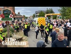 Protesters clash with police and counter-demonstrators near Epping hotel