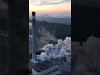 Power plant chimneys demolished in controlled blast