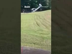 Moment plane flips over after crash landing in GARDEN