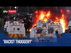 'Extremely violent' night in Belfast as hundreds of masked men confront police