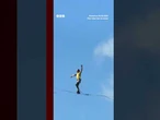Competitors walk slackline 400m above a Chinese gorge. #BBCNews