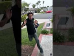 Lightning strikes tree behind young child during SoCal thunderstorms