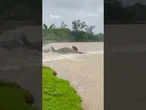 Horror moment house collapses into river in the Philippines