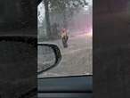 Terrifying moment driver gets trapped in SUV as street floods around him #flood #driving #rescue