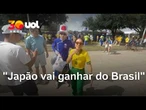 BRASIL X JAPÃO: TORCEDOR DISTRIBUI BANDEIRAS DO JAPÃO E PREVÊ VITÓRIA CONTRA O BRASIL