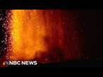 Eruptions from Italy's Mount Etna illuminate Sicily's sky