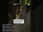 Cristiano Ronaldo waves to fans from his hotel window