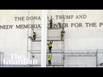 Workers set up scaffolding outside Kennedy Center
