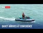 Sir Ed Davey arrives at Lib Dem conference on a jet ski