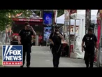 MANHUNT: Police search for second suspect after Seattle bloodshed