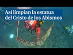 Así limpian buzos bajo el mar la estatua del Cristo de los Abismos en Italia