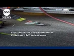 California firefighters give oxygen to pigeon in distress