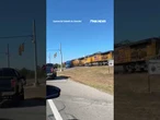 'GET OUT OF THE TRUCK!': Driver escapes before train barrels into semi-trailer truck #shorts #usa