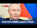 Putin attends plenary session at St Petersburg forum