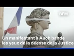 Rassemblements pour Lyhanna: un manifestant bande les yeux de la déesse de la justice Thémis à Auch