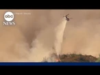 Firefighters battle raging fires and dangerous heat
