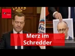 Medwedew zeigt KI-Video, indem er Merz-Foto schreddert