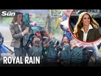 Newly-blonde Kate gets caught in POURING RAIN alongside screaming school kids