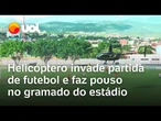 Helicóptero pousa em gramado durante jogo de futebol em estádio em Jequié, na Bahia; veja vídeo