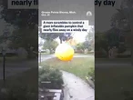 A mom scrambles to control a giant inflatable pumpkin that nearly flies away on a windy day