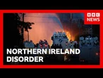 Twelve police officers injured and water cannon fired after second night of NI riots | BBC News