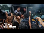 Rahul Gandhi detained and pulled on to bus after calling for PM Modi to resign