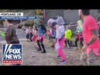 'ABSURD': Host break down in LAUGHTER at activists doing aerobics amid ICE riots
