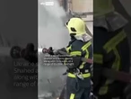 Burning buildings in Ukrainian city after latest Russian attack