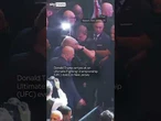 Trump gets warm welcome at fight event