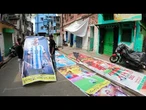 Torcedores de futebol na Índia decoram ruas com tema de Copa do Mundo | AFP