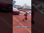 Chinese teacher pulls CAR while doing handstand